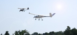 Old and New - Breezy Leading E430 at Oshkosh