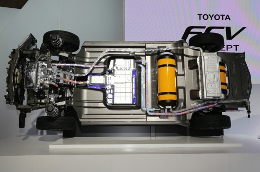Underside of FCV Concept shows fuel cell stack and orange hydrogen fuel tank 