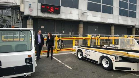 Bright yellow charging stations flank Sea-Tac's concourses and serve a variety of electric GSEs
