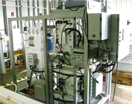 Skid-based platform tests potential to scale up processing seawater to make fuel.  Photo courtesy U. S. Navy