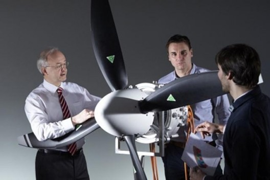 Dr. Frank Anton and associates examine 50 kilogram, 260 kilowatt motor 