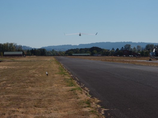 All 13 horsepower pushing the little craft into the blue skies