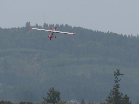 Mark Beierle on final into Twin Oaks Airpark.  Note large flaps for steep approaches, short landings