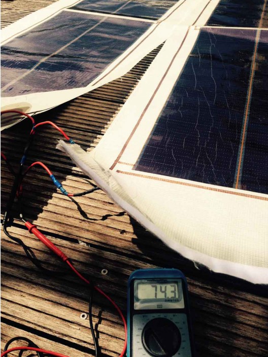 Following 2,500 nautical mile race, solar cells were unzipped from sails, and used on sail covers to recharge boat's batteries